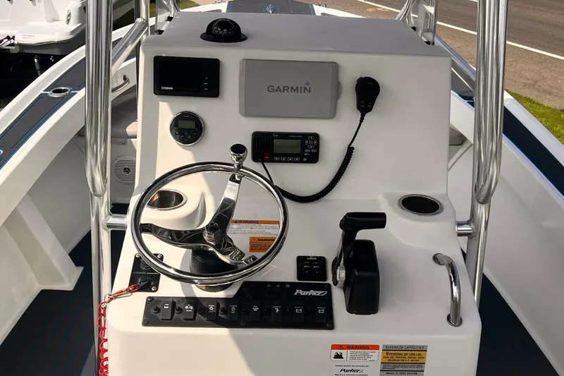 Slide: The Image of Control console of a 2016 Parker 2100 Special Edition boat with Garmin navigation. - 4