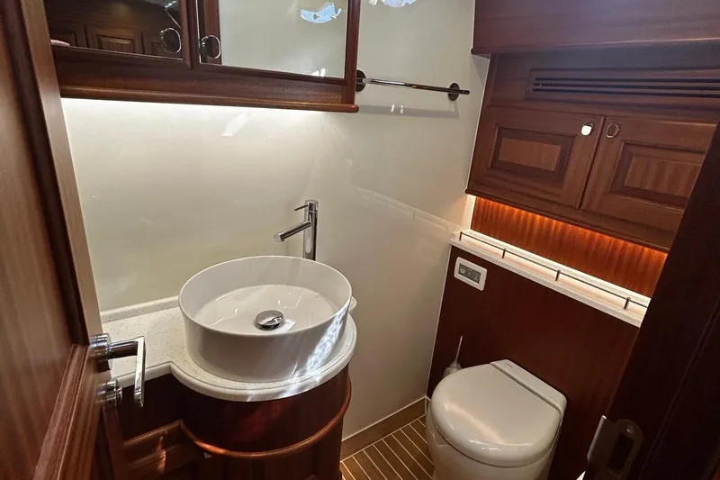 Slide: The Image of Luxurious bathroom in 2026 Vicem 55 Classic yacht with modern sink and wooden cabinetry. - 14