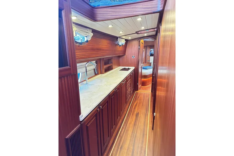 Slide: The Image of Luxurious interior of 2026 Vicem 55 Classic yacht with elegant wood finishes and modern amenities. - 5