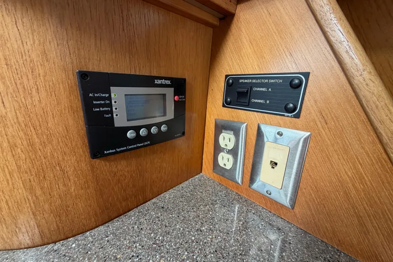 Slide: The Image of Control panel and outlets on 1998 Bayliner 4788 Pilot House Motoryacht interior. - 24
