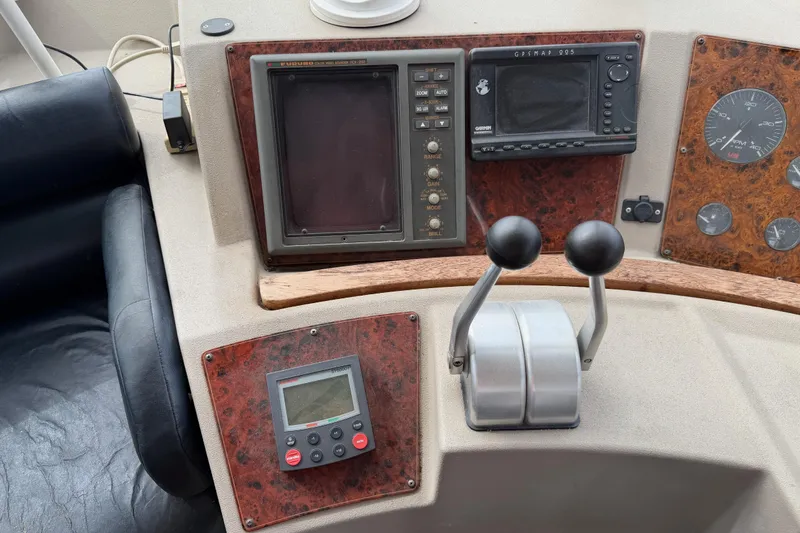 Slide: The Image of Control panel of 1998 Bayliner 4788 Pilot House Motoryacht with navigation instruments. - 30