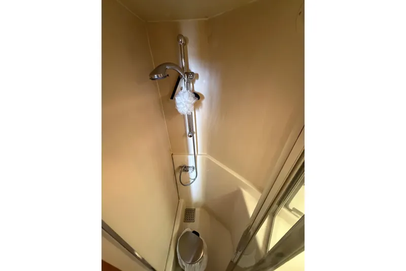 Slide: The Image of Shower area in 1998 Bayliner 4788 Pilot House Motoryacht, featuring modern fixtures. - 52