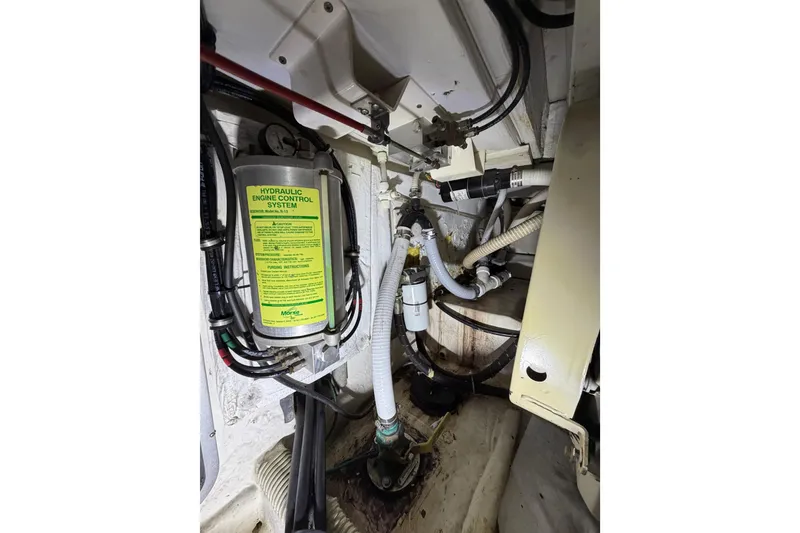 Slide: The Image of Engine room of 1998 Bayliner 4788 Pilot House Motoryacht with hydraulic control system. - 79