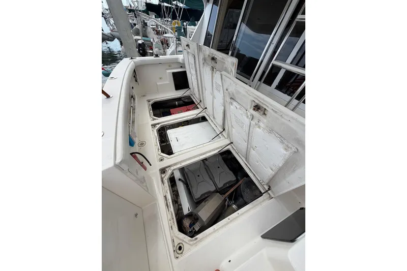 Slide: The Image of Open engine compartment of 1998 Bayliner 4788 Pilot House Motoryacht at dock. - 81