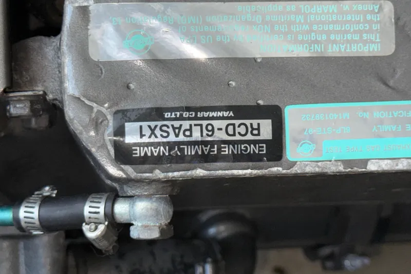 Slide: The Image of Engine label on 2007 Mainship Pilot 30 Sedan, featuring Yanmar RCD-6LPASX1. - 24