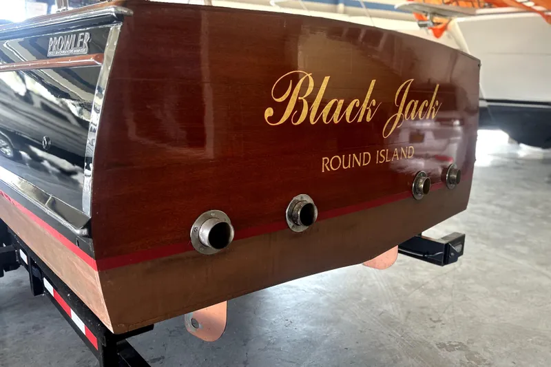 Slide: The Image of Vintage 1962 Prowler Forest Johnson boat named "Black Jack" at Round Island. - 9