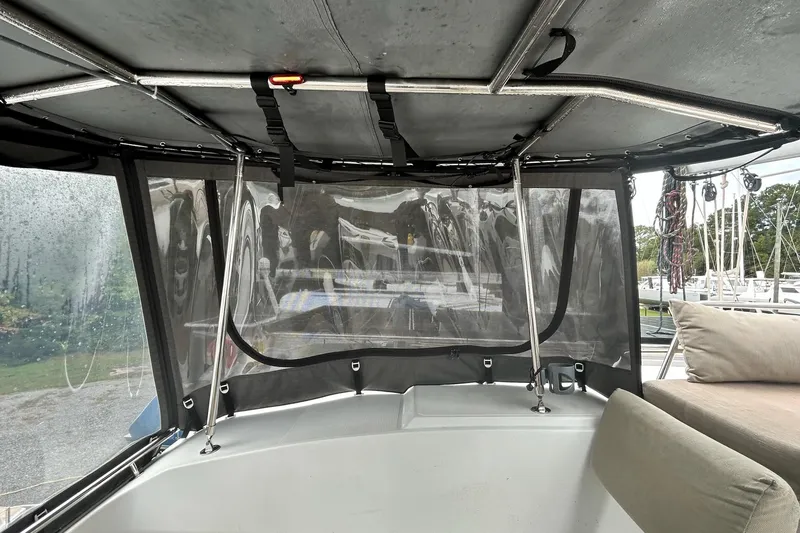Slide: The Image of 2019 Fountaine Pajot Helia 44 Evolution cockpit with protective canopy and comfortable seating. - 20
