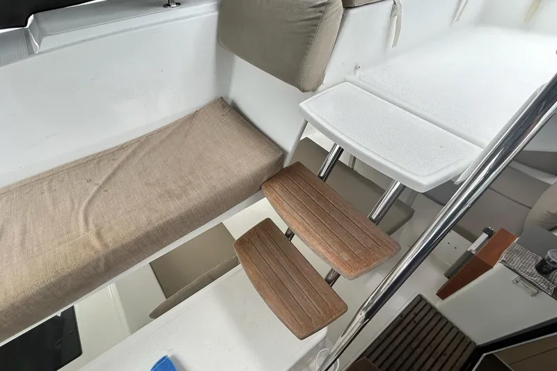 Slide: The Image of Interior view of 2019 Fountaine Pajot Helia 44 Evolution catamaran with wooden steps and seating. - 21