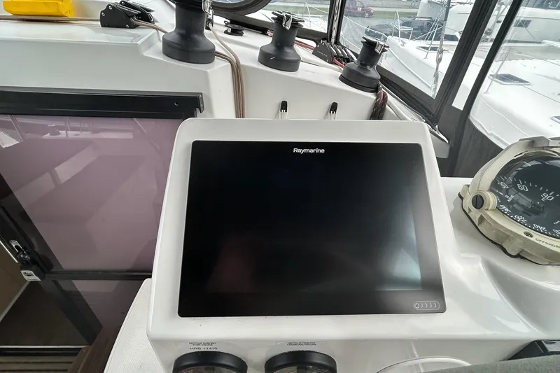 Slide: The Image of Helm station of 2019 Fountaine Pajot Helia 44 Evolution with Raymarine display. - 22