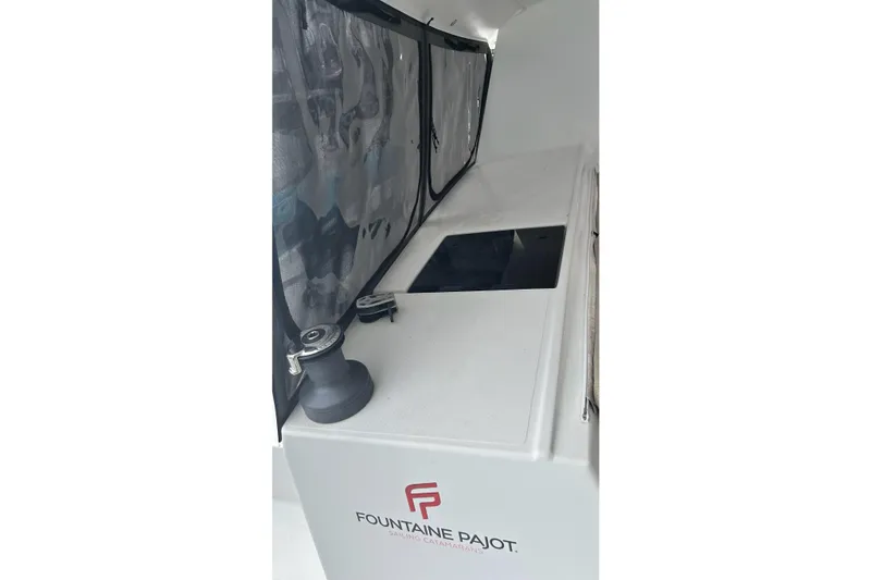 Slide: The Image of 2019 Fountaine Pajot Helia 44 Evolution yacht deck with winch and logo. - 47