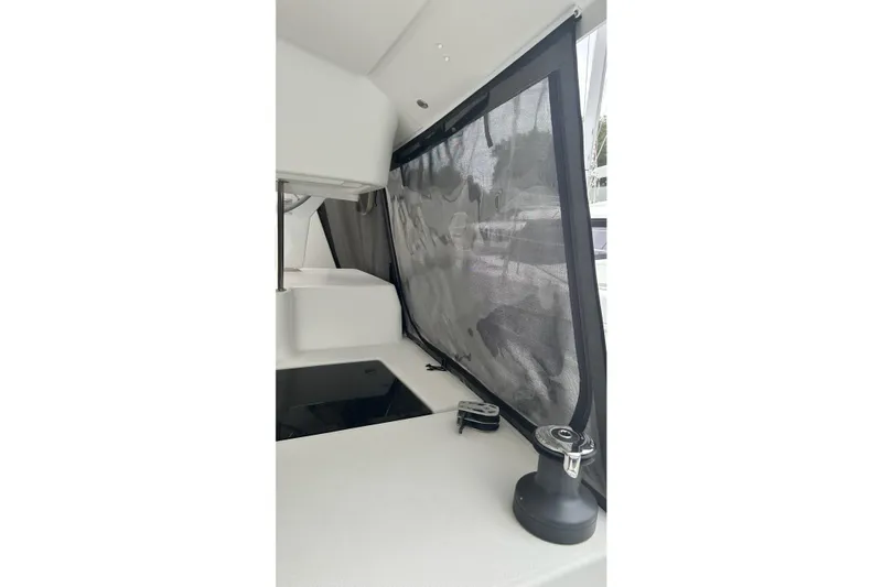 Slide: The Image of Interior view of 2019 Fountaine Pajot Helia 44 Evolution yacht with shaded window. - 48
