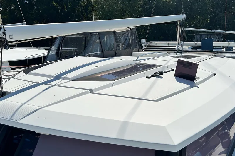 Slide: The Image of 2019 Fountaine Pajot Helia 44 Evolution catamaran deck with sleek design and modern features. - 5