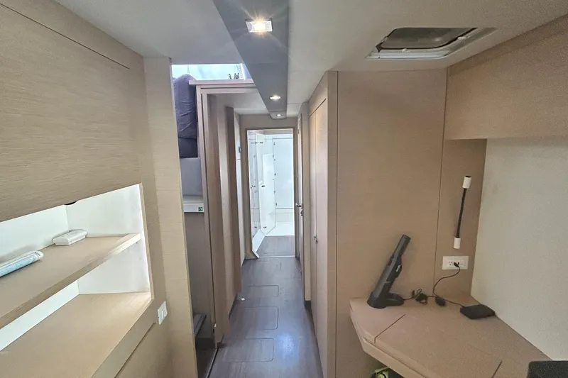 Slide: The Image of Interior of 2019 Fountaine Pajot Helia 44 Evolution catamaran, featuring modern design and wood finishes. - 57