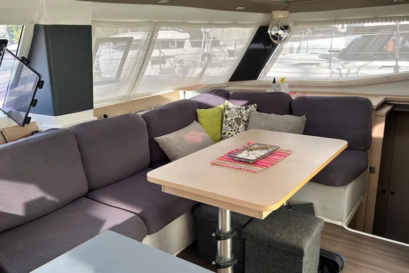 Slide: The Image of Interior of 2019 Fountaine Pajot Helia 44 Evolution catamaran with cozy seating and dining area. - 62