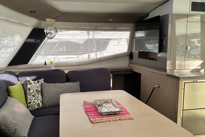 Slide: The Image of Interior of 2019 Fountaine Pajot Helia 44 Evolution catamaran with cozy seating and modern decor. - 64