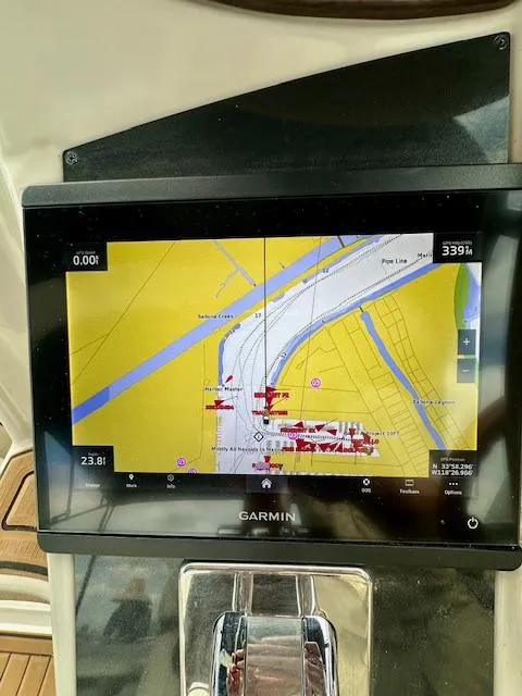 Slide: The Image of Garmin navigation display on 2006 Doral Elegante boat, showing a detailed marine map. - 14