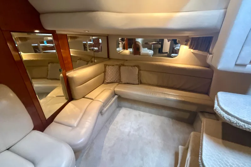 Slide: The Image of Luxurious interior of 2004 Sea Ray 380 Sundancer yacht with plush seating and elegant design. - 29