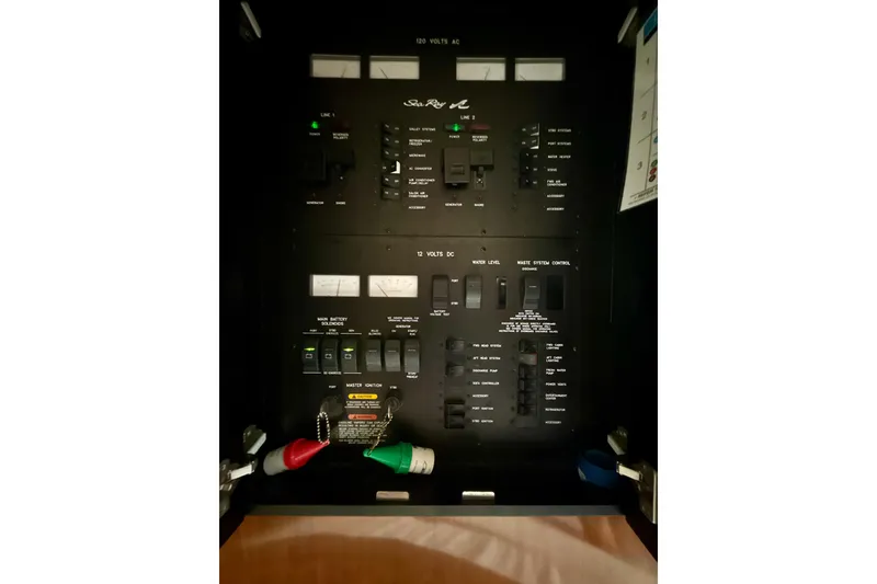Slide: The Image of Electrical control panel of 2004 Sea Ray 380 Sundancer boat. - 40