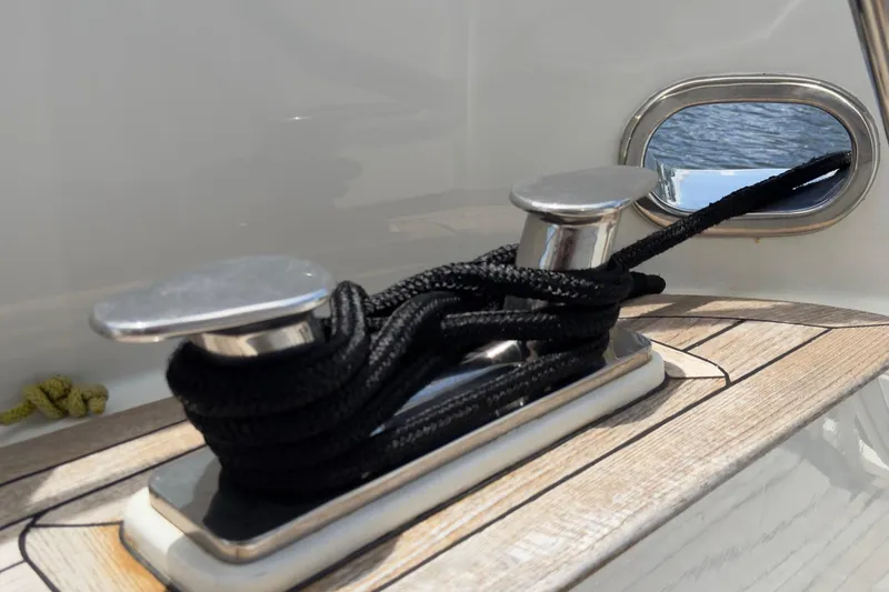 Slide: The Image of 2006 Cheoy Lee 84 Bravo yacht with sun loungers on deck, under a partly cloudy sky. - 17