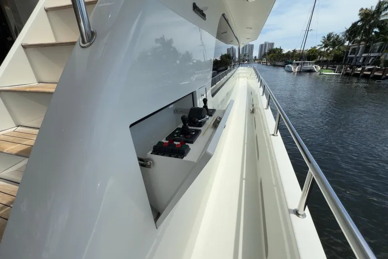 Slide: The Image of Luxurious 2006 Cheoy Lee 84 Bravo yacht deck with modern amenities and scenic water view. - 22