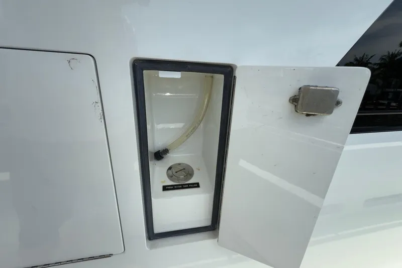 Slide: The Image of Spacious deck of 2006 Cheoy Lee 84 Bravo yacht with seating and American flag. - 24