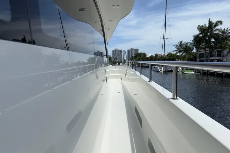 Slide: The Image of Luxurious 2006 Cheoy Lee 84 Bravo yacht deck with seating and bar area. - 26