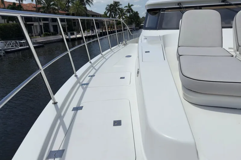 Slide: The Image of Helm of 2006 Cheoy Lee 84 Bravo yacht with navigation screens and controls. - 32