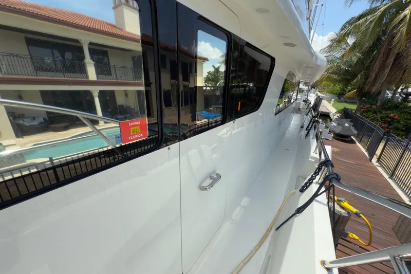 Slide: The Image of Luxurious interior of 2006 Cheoy Lee 84 Bravo yacht with waterfront view. - 36