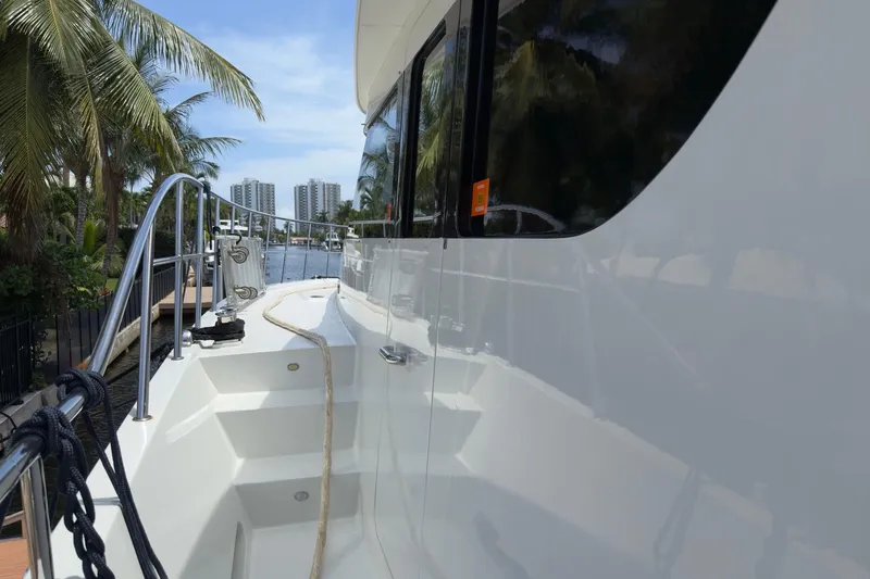 Slide: The Image of Luxurious 2006 Cheoy Lee 84 Bravo yacht interior with elegant wood finishes and modern amenities. - 41