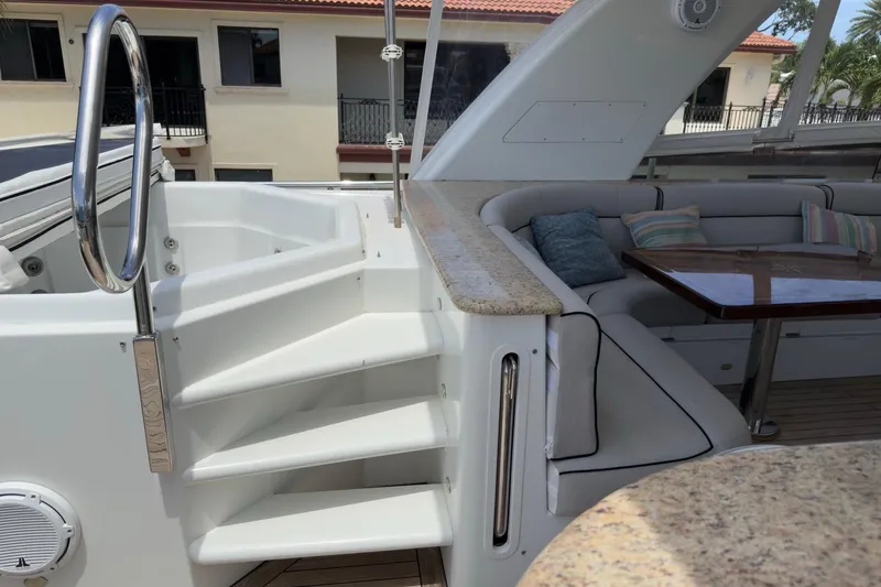 Slide: The Image of Luxurious 2006 Cheoy Lee 84 Bravo yacht bedroom with elegant wood paneling and cozy decor. - 47