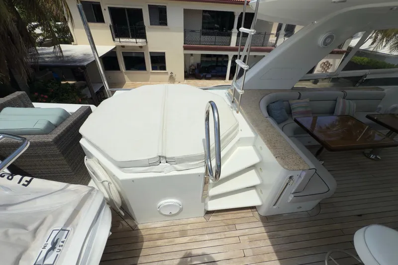 Slide: The Image of Luxurious 2006 Cheoy Lee 84 Bravo yacht cabin with cozy bed and elegant wood finishes. - 50