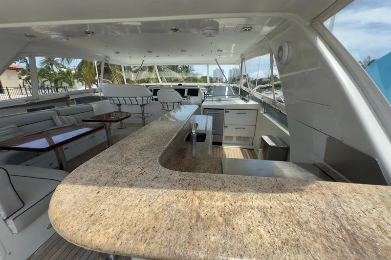 Slide: The Image of Engine room access and kitchenette on 2006 Cheoy Lee 84 Bravo yacht. - 53