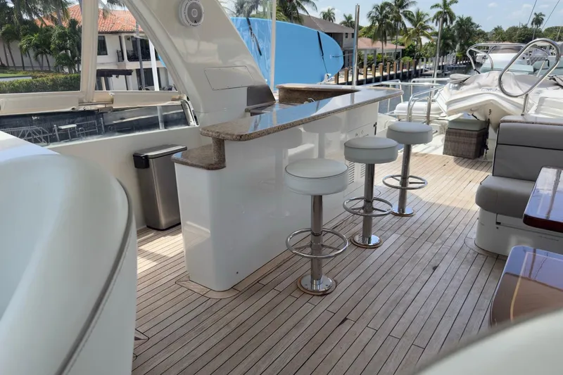 Slide: The Image of Engine room of 2006 Cheoy Lee 84 Bravo yacht with electrical equipment and fire extinguisher. - 59