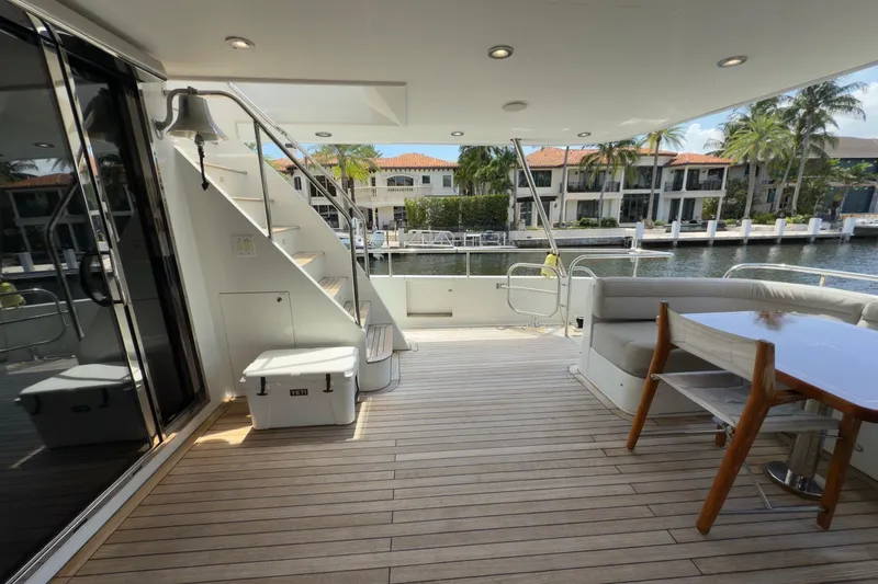 Slide: The Image of Cheoy Lee 84 Bravo 2006 yacht "Family Time" cruising with American flag and jet ski. - 8