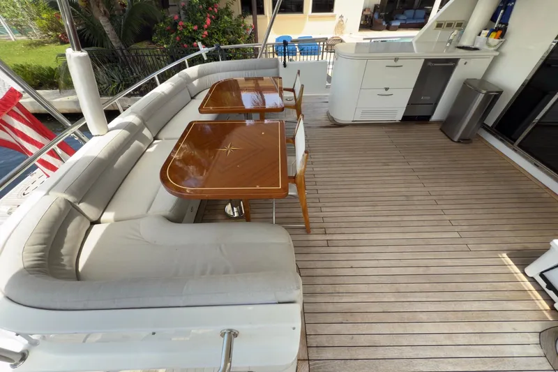 Slide: The Image of Aerial view of 2006 Cheoy Lee 84 Bravo yacht deck with seating and jet ski. - 11