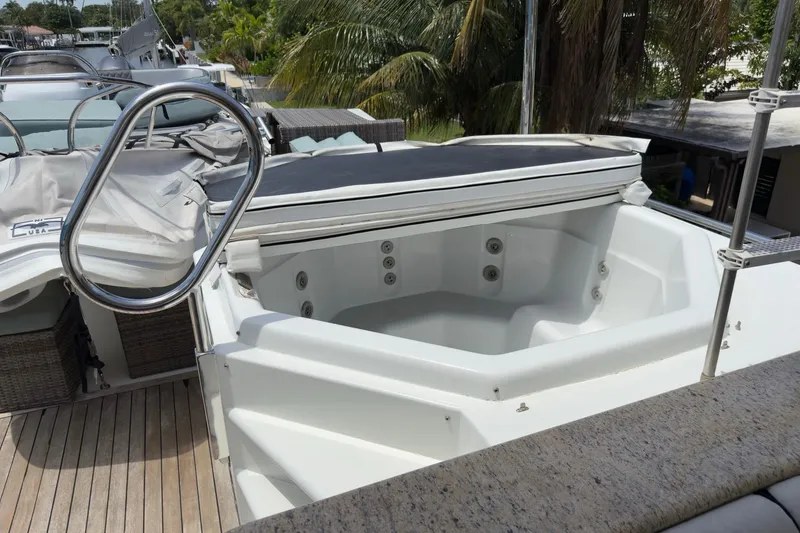 Slide: The Image of Luxurious bedroom interior of 2006 Cheoy Lee 84 Bravo yacht with elegant wood finishes. - 48