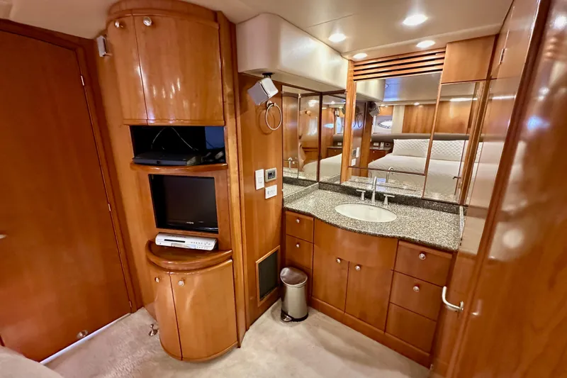 Slide: The Image of Luxurious 2004 Meridian 580 Pilothouse interior with wood cabinetry and modern amenities. - 134