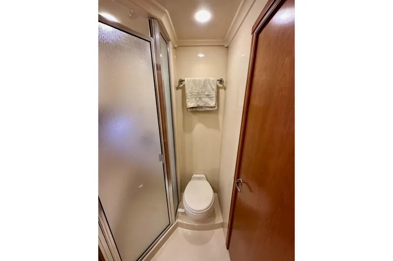 Slide: The Image of Bathroom in 2004 Meridian 580 Pilothouse yacht with shower and toilet. - 156