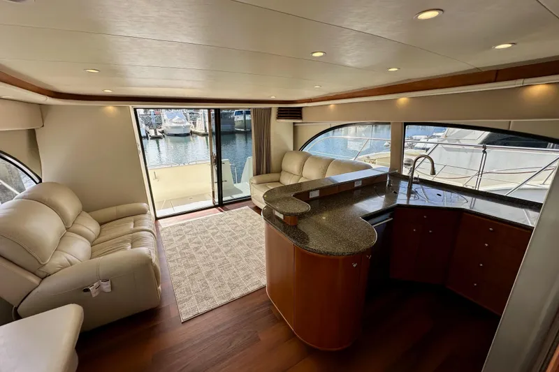 Slide: The Image of Luxurious interior of 2004 Meridian 580 Pilothouse yacht with plush seating and elegant design. - 163