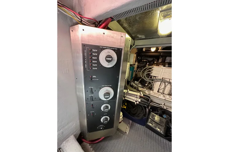 Slide: The Image of Electrical panel in 2004 Meridian 580 Pilothouse engine room, showcasing wiring and components. - 29