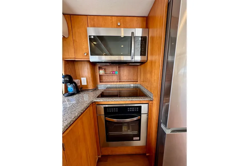 Slide: The Image of Modern kitchen in 2004 Meridian 580 Pilothouse yacht with stainless steel appliances. - 85