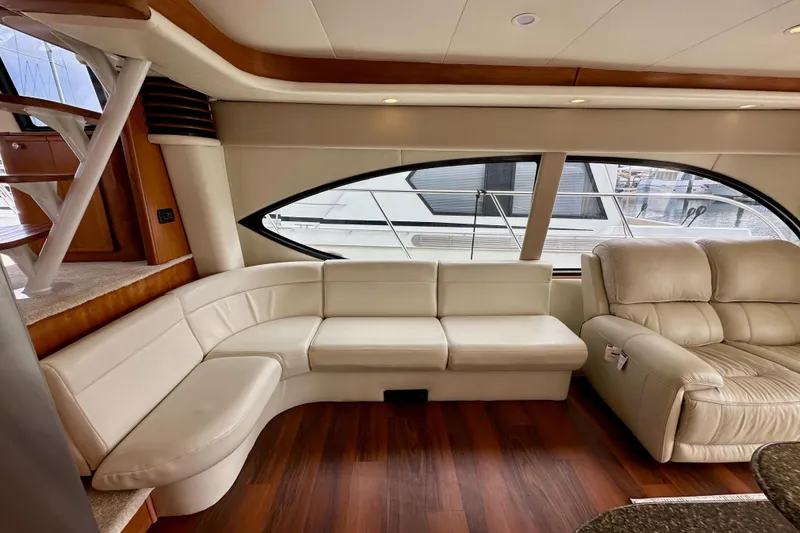 Slide: The Image of Luxurious interior of 2004 Meridian 580 Pilothouse yacht with leather seating and wood accents. - 86