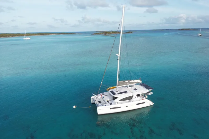Slide: The Image of Aerial view of 2020 Leopard 40 catamaran sailing in clear turquoise waters. - 104