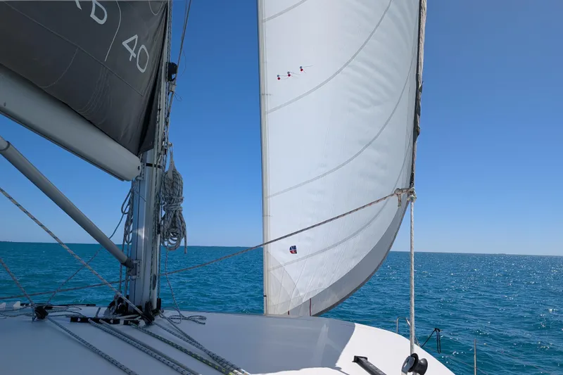 Slide: The Image of Sailing on a 2020 Leopard 40 catamaran with clear blue skies and ocean. - 106