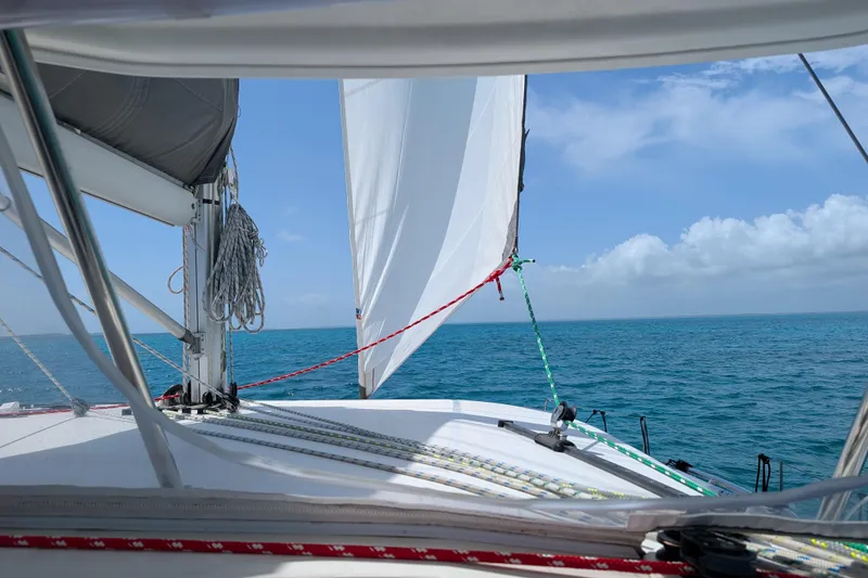 Slide: The Image of Sailing on a 2020 Leopard 40 catamaran, clear blue ocean and sky in view. - 107