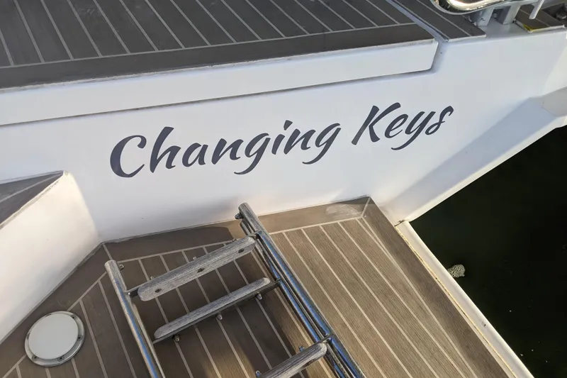 Slide: The Image of Leopard 40 yacht "Changing Keys" with wooden deck and ladder, 2020 model. - 117