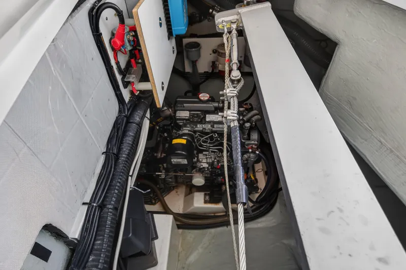 Slide: The Image of Engine compartment of a 2020 Leopard 40 catamaran, showcasing wiring and mechanical components. - 25