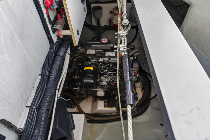 Slide: The Image of Engine compartment of a 2020 Leopard 40 catamaran, showcasing detailed wiring and components. - 27