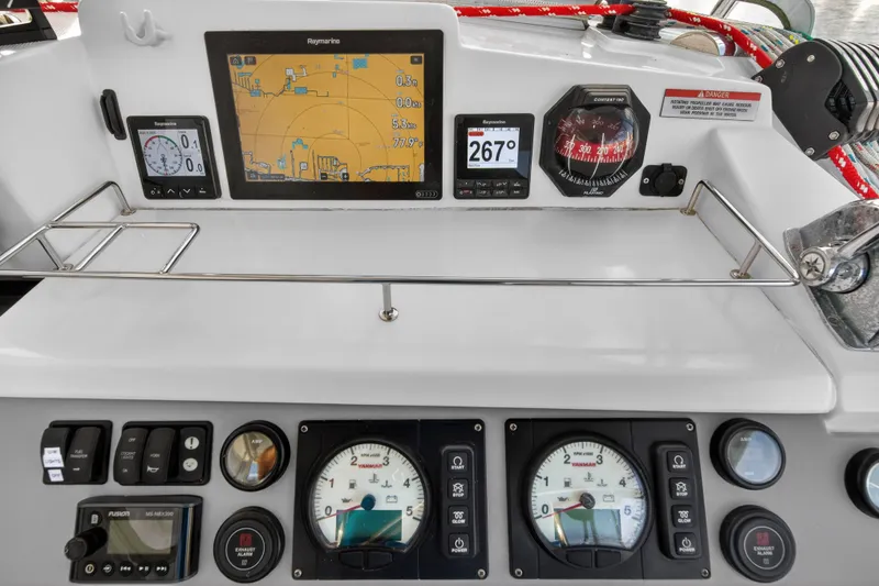 Slide: The Image of Control panel of a 2020 Leopard 40 catamaran with navigation and engine instruments. - 31
