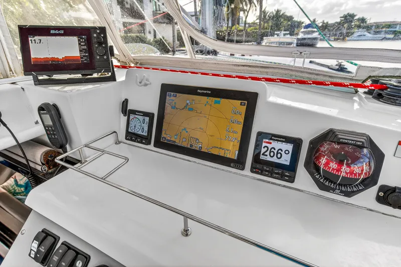Slide: The Image of Leopard 40 yacht cockpit with navigation instruments, 2020 model, featuring GPS and compass. - 32